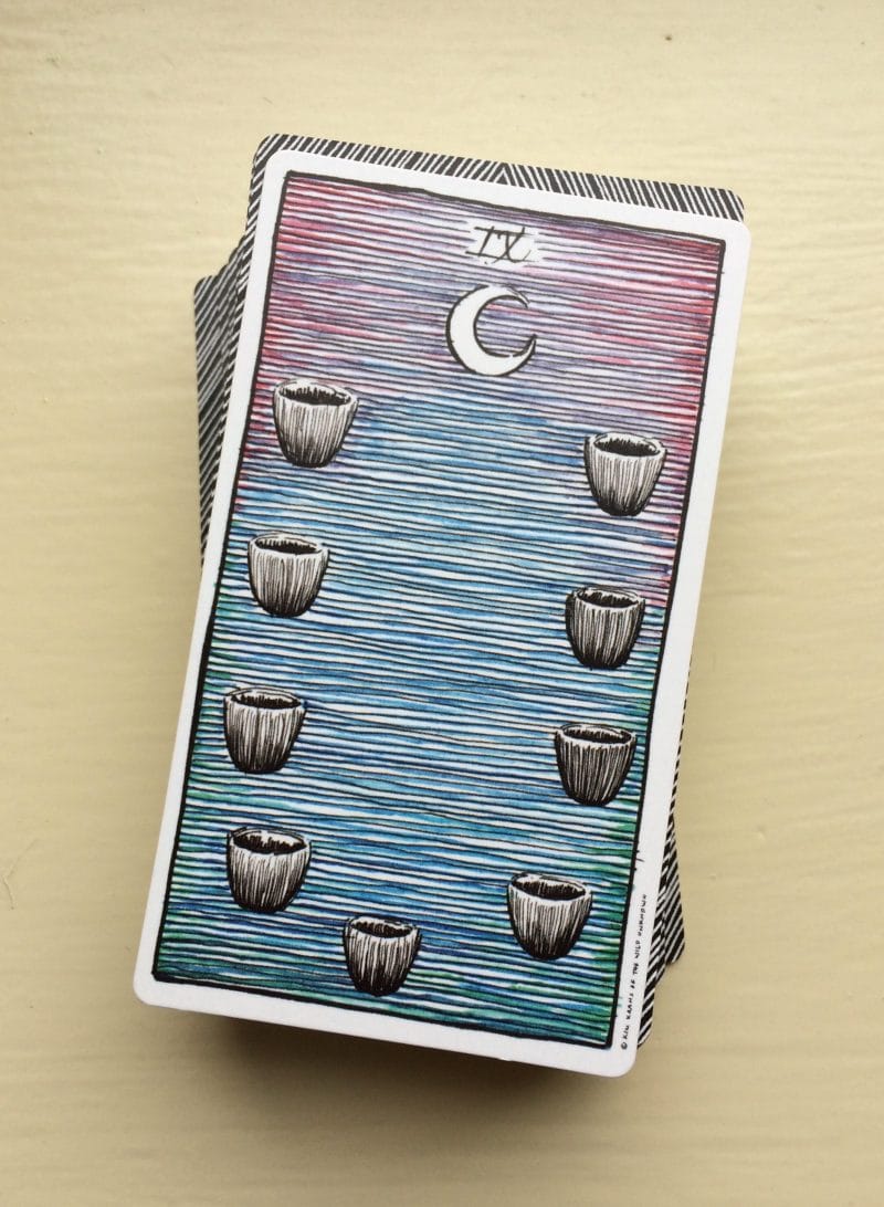 9 Of Cups chính là tấm gương phản chiếu niềm hạnh phúc dâng tràn trong tất cả các khía cạnh trong đời sống